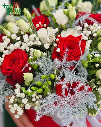 Box of red roses and eustomas